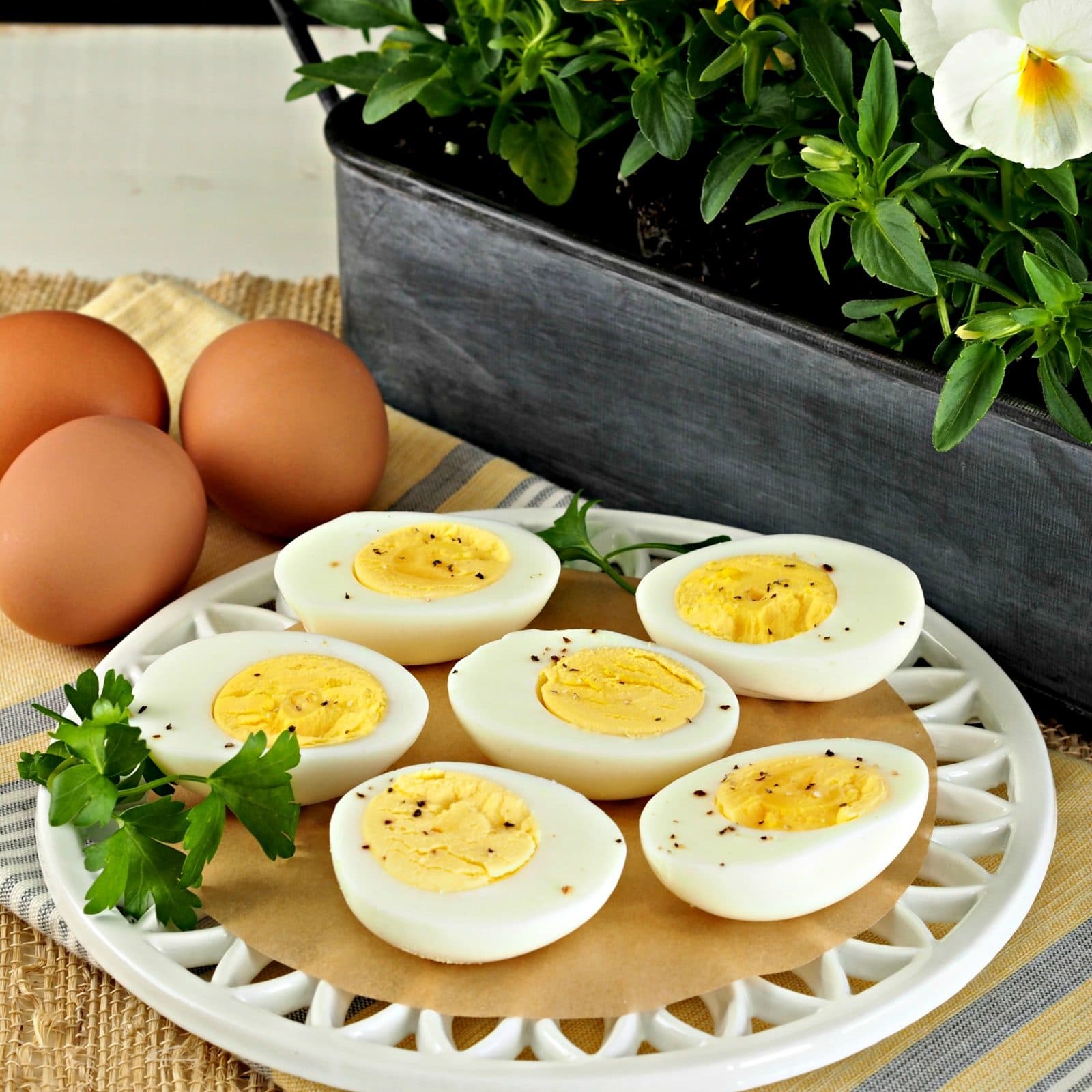 Hard-Cooked Steamed Eggs. Steaming eggs instead of boiling them creates eggs with yellow yolks, perfect whites & eggs easier to peel. Egg perfection. Simply Sated